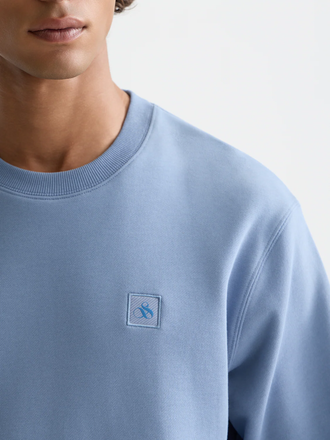 Seasonal core logo badge regular-fit sweatshirt - Image 10