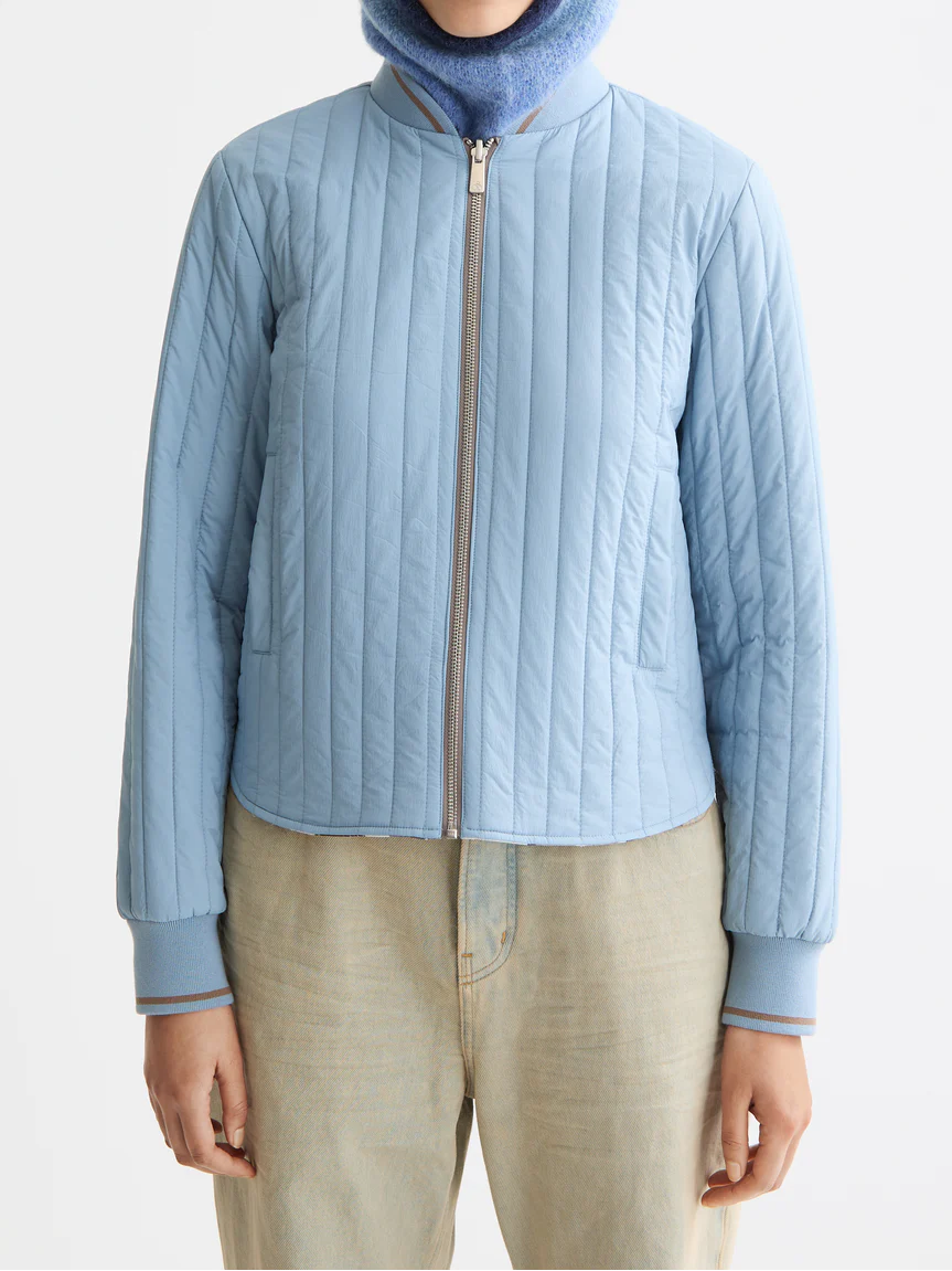Reversible printed quilted bomber