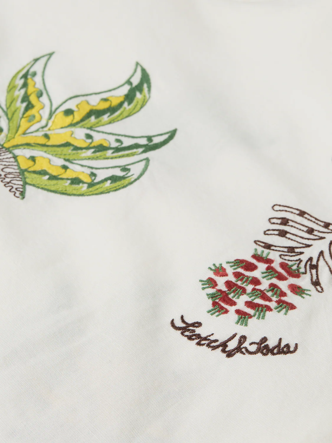 Embroidered short bib dress - Image 7